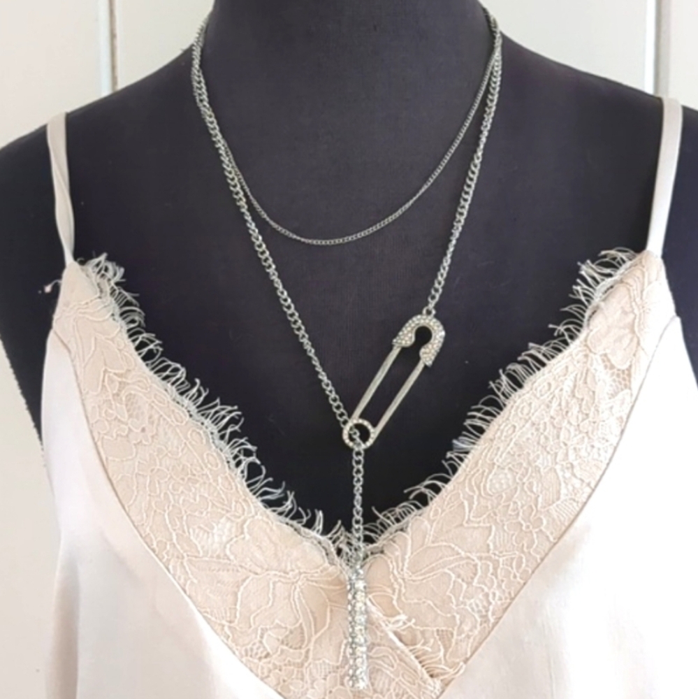 Silver and Crystal Layered Necklaces with Intricate Charm